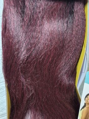 Outre Converti-Cap synthetic wig in the style Hawaiian Hottie